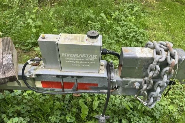 Slide: The Image of Trailer hitch with Hydrastar brake actuator on a 2008 Ranger 2510 Bay Ranger. - 12