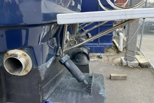 Slide: The Image of 2008 Ranger 2510 Bay Ranger boat stern with trim tabs and exhaust detail. - 9