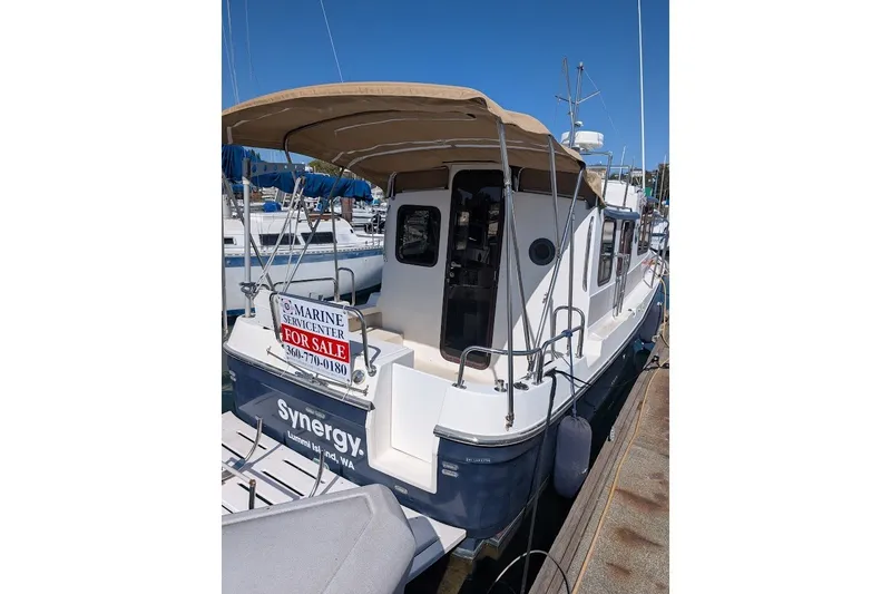 Slide: The Image of 2008 Ranger 2510 Bay Ranger boat for sale at marina dock. - 16