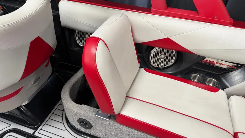 Slide: The Image of The image shows the interior of a 2015 Malibu Wakesetter 23 LSV with red and white seating. - 29