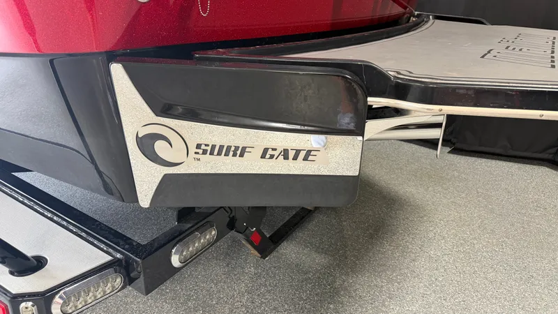 Slide: The Image of Close-up of the Surf Gate system on a 2015 Malibu Wakesetter 23 LSV. - 8