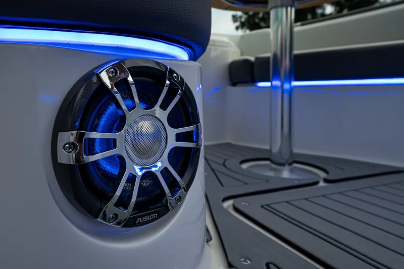 Slide: The Image of Close-up of a speaker with blue lighting on a Sea Ray SLX 400 boat. - 41