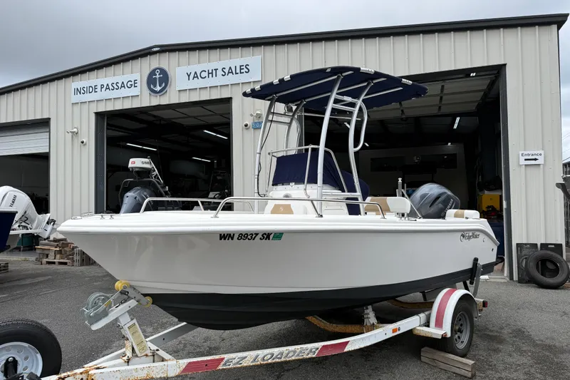 Slide: The Image of 2015 Edgewater 170CC boat on trailer at yacht sales facility. - 4