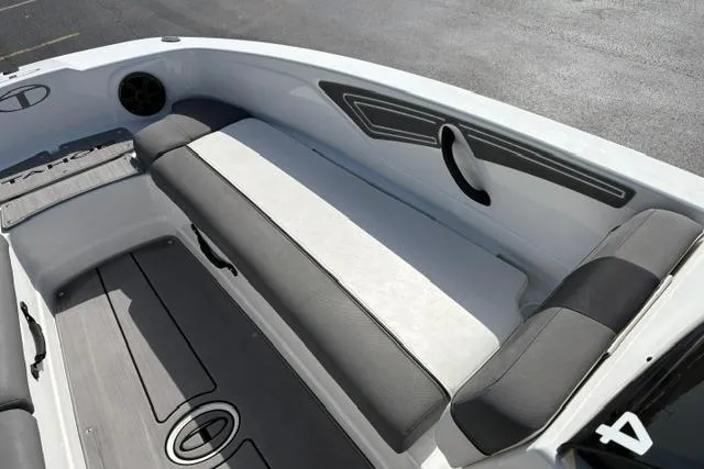 Slide: The Image of 2024 Tahoe T21 boat interior with sleek seating and modern design. - 16