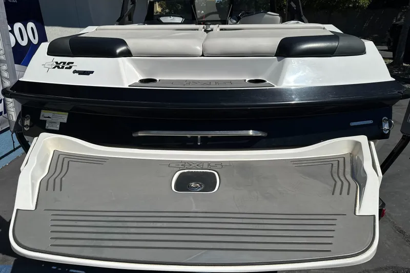 Slide: The Image of 2015 Axis A20 boat rear view with swim platform and seating area. - 30