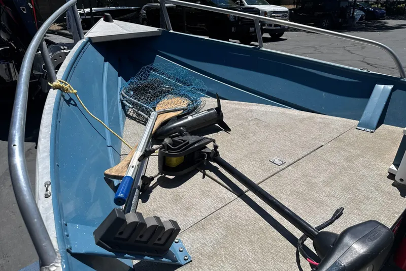 Slide: The Image of 2004 Klamath 16 Alaskan boat interior with fishing gear and equipment. - 15