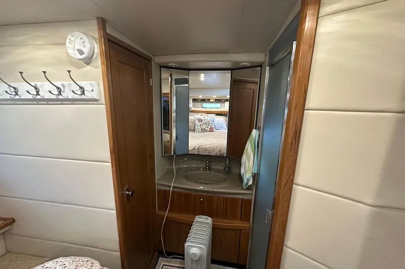 Slide: The Image of Interior of 2000 Bayliner 4087 Aft Cabin Motoryacht with vanity and mirror. - 23