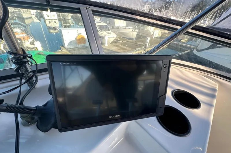 Slide: The Image of Garmin GPSMAP XS on 2000 Bayliner 4087 Aft Cabin Motoryacht dashboard. - 16