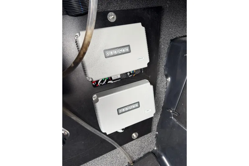 Slide: The Image of Audio amplifiers in a 2023 Tigé Z1 boat, featuring Audison components. - 11