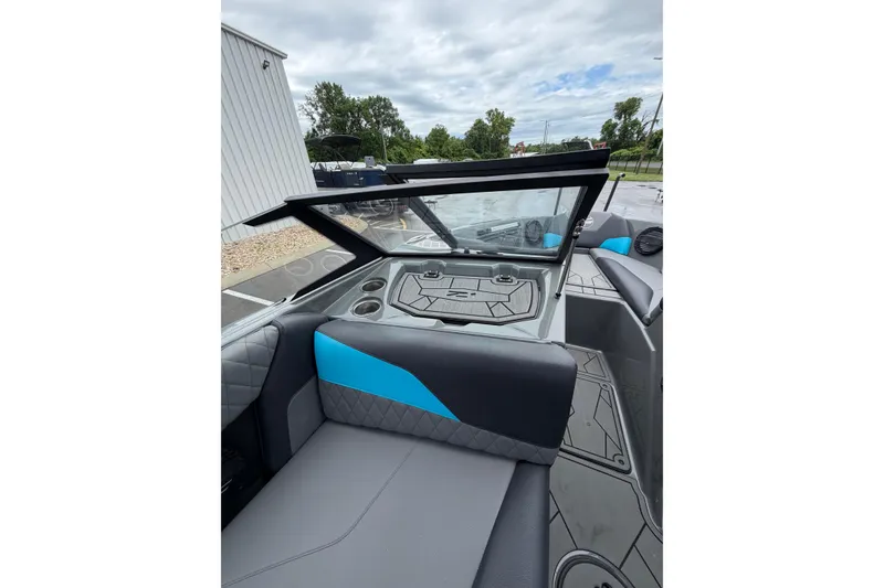 Slide: The Image of 2023 Tigé Z1 boat interior with modern seating and sleek design elements. - 4