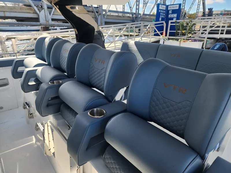 Slide: The Image of The luxurious seating of the Cruisers Yachts 45VTR offers comfort and style, perfect for leisurely boating. - 48