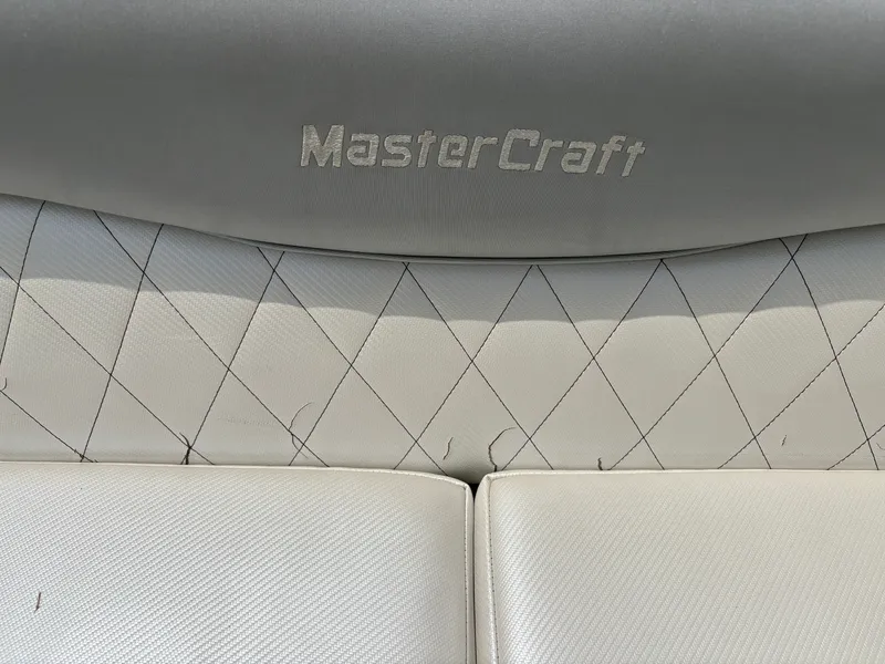 Slide: The Image of Close-up of a MasterCraft boat's upholstered seats with a quilted pattern. - 20