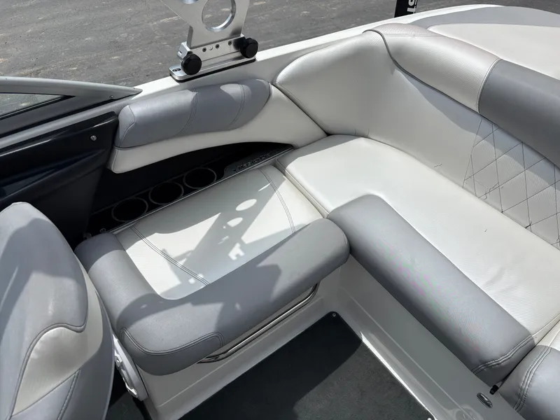 Slide: The Image of Interior of a 2011 MasterCraft X2 with gray and white upholstery. - 18