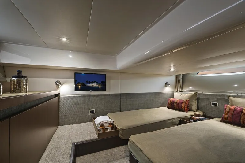 Slide: The Image of Manufacturer Provided Image: Luxurious cabin interior of 2018 Sea Ray Fly 460 yacht with twin beds and modern decor. - 11