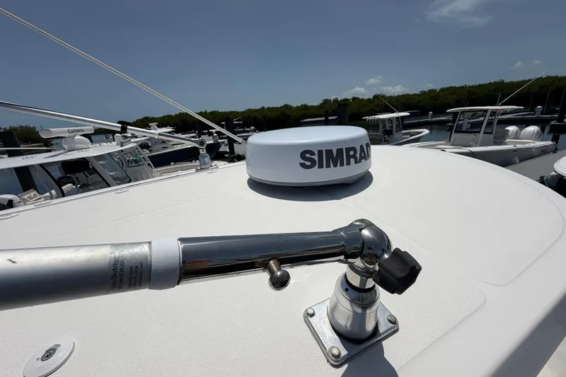 Slide: The Image of 2019 Sea Hunt Gamefish 27 Coffin Box with Simrad radar, docked in a marina. - 15