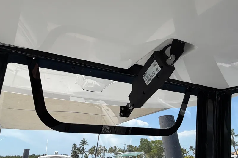 Slide: The Image of 2019 Sea Hunt Gamefish 27 Coffin Box boat interior detail with hatch mechanism. - 35