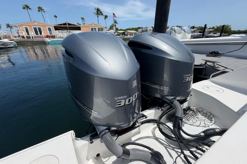 Slide: The Image of Twin Yamaha 300 outboard engines on a 2019 Sea Hunt Gamefish 27 Coffin Box boat. - 21