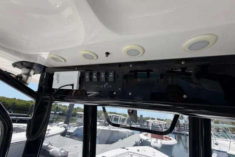 Slide: The Image of Control panel of a 2019 Sea Hunt Gamefish 27 Coffin Box boat at a marina. - 14
