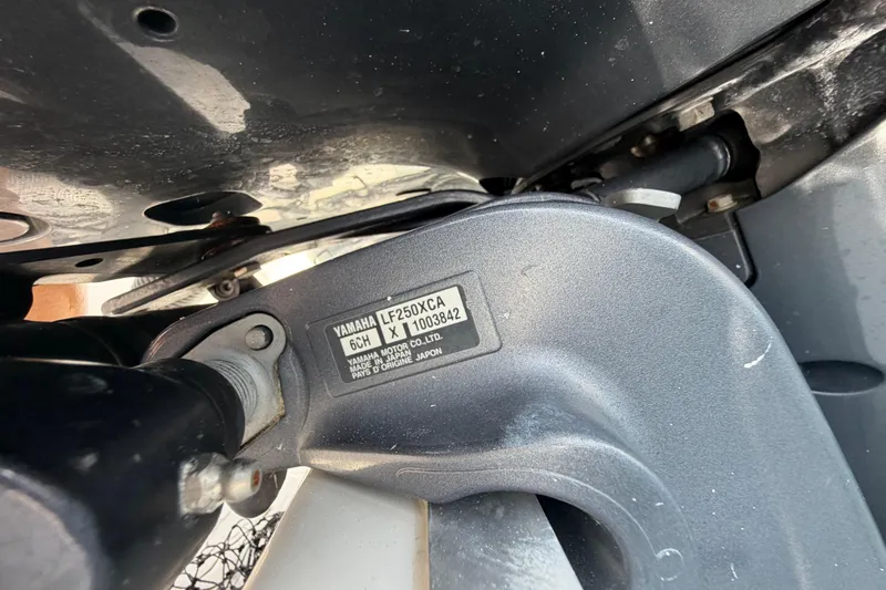 Slide: The Image of Close-up of a Yamaha LF250XCA engine part on a 2019 Sea Hunt Gamefish 27 Coffin Box boat. - 24
