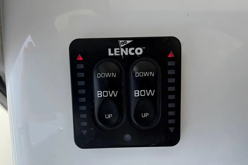 Slide: The Image of Lenco trim tab control panel on 2019 Sea Hunt Gamefish 27 Coffin Box boat. - 28