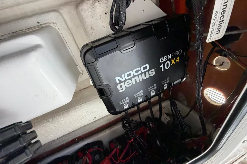 Slide: The Image of NOCO Genius GENPRO 10X4 charger installed in 2019 Sea Hunt Gamefish 27 Coffin Box boat. - 36