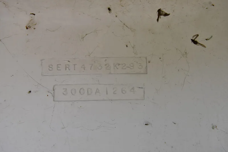 Slide: The Image of Hull identification number on a 1993 Sea Ray 300 Sundancer boat. - 9