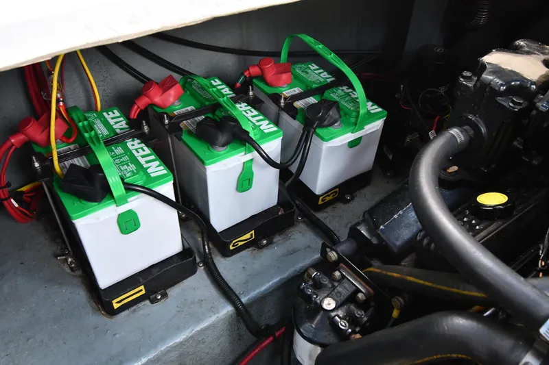 Slide: The Image of Three Interstate batteries in a 1993 Sea Ray 300 Sundancer engine compartment. - 39