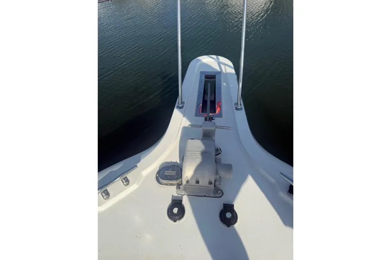Slide: The Image of Bow view of 1992 Carver 33 Aft Cabin Motor Yacht, featuring anchor equipment. - 12