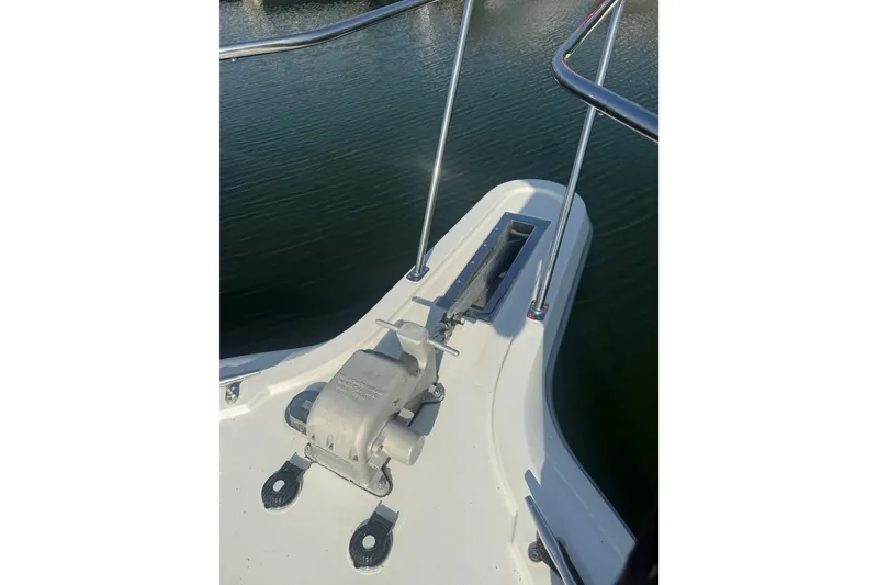 Slide: The Image of Bow of 1992 Carver 33 Aft Cabin Motor Yacht with anchor winch. - 13