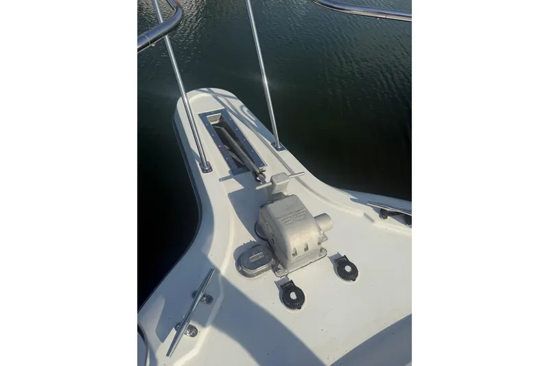 Slide: The Image of Bow of 1992 Carver 33 Aft Cabin Motor Yacht with anchor winch. - 11