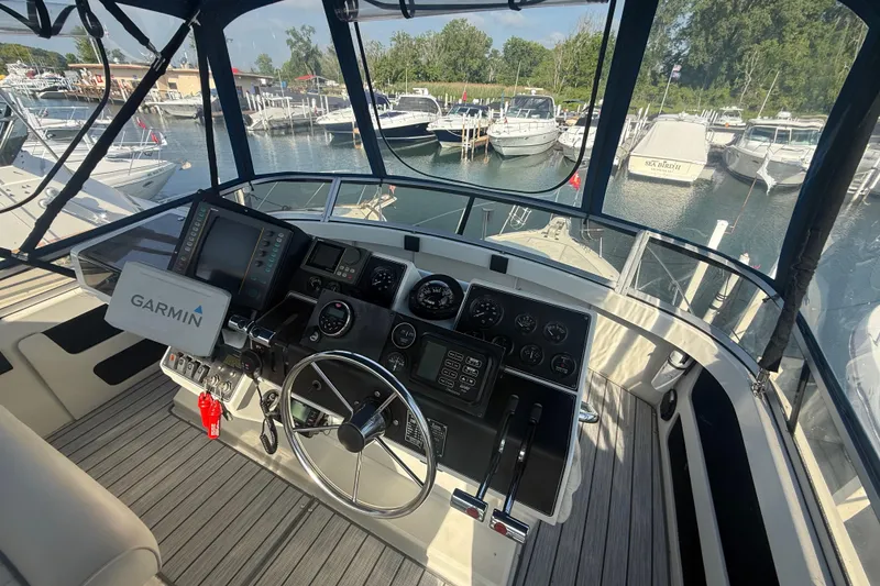 Slide: The Image of Cockpit view of 1992 Carver 33 Aft Cabin Motor Yacht with Garmin navigation system. - 20