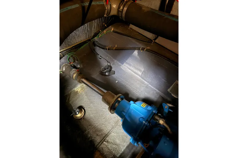 Slide: The Image of Engine compartment of 1992 Carver 33 Aft Cabin Motor Yacht, featuring mechanical components. - 55