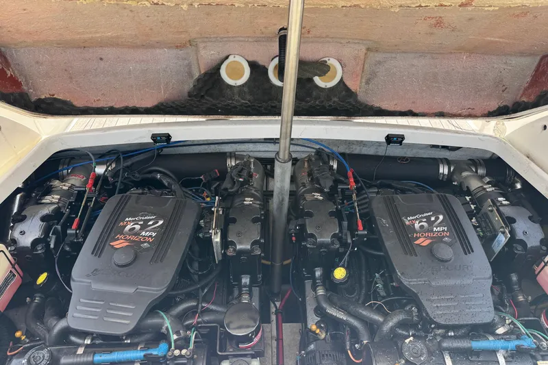 Slide: The Image of Engine compartment of a 2005 Chris-Craft Launch 28 with MerCruiser 6.2 MPI Horizon engines. - 44