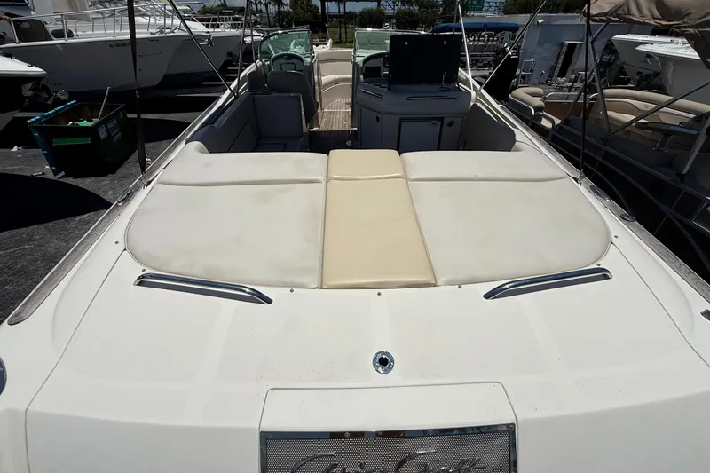 Slide: The Image of 2005 Chris-Craft Launch 28 boat with spacious seating and sleek design. - 8