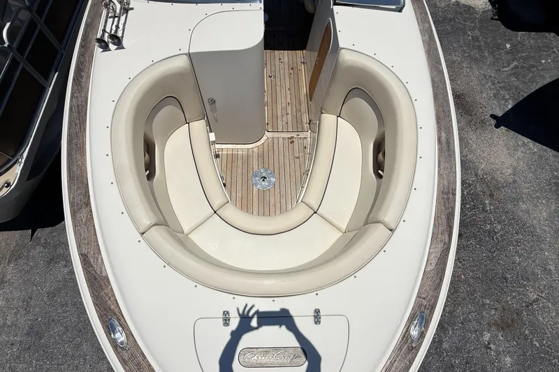 Slide: The Image of 2005 Chris-Craft Launch 28 boat with elegant seating and wooden deck details. - 23