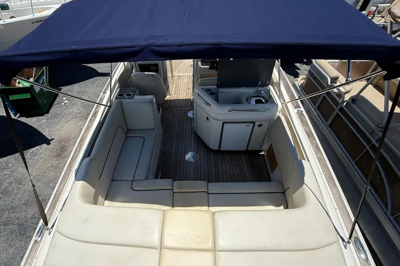 Slide: The Image of 2005 Chris-Craft Launch 28 boat interior with seating and canopy. - 9