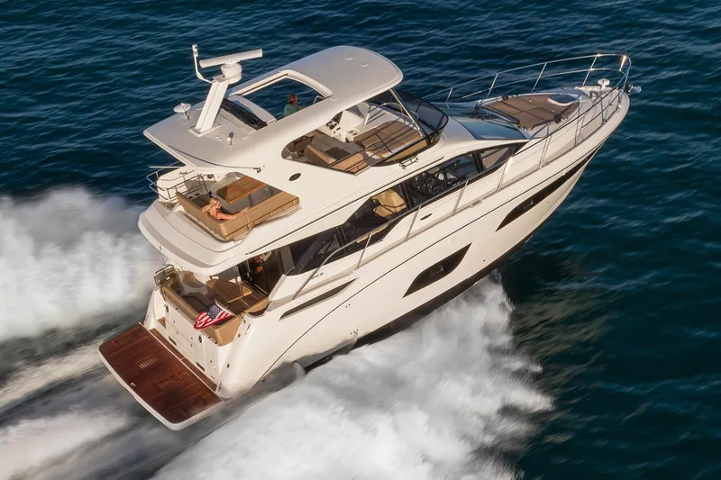 Slide: The Image of Manufacturer Provided Image: 2018 Sea Ray Fly 460 yacht cruising on open water. - 2