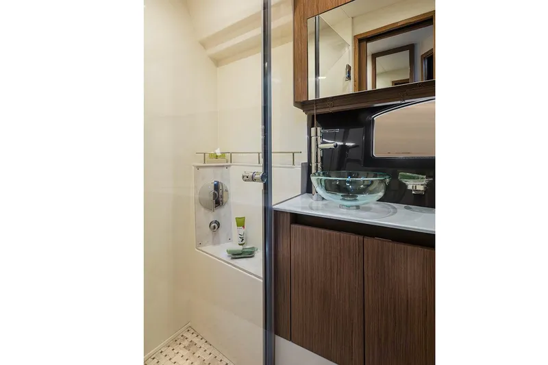 Slide: The Image of Manufacturer Provided Image: 2018 Sea Ray Fly 460 yacht bathroom with glass sink and shower. - 14