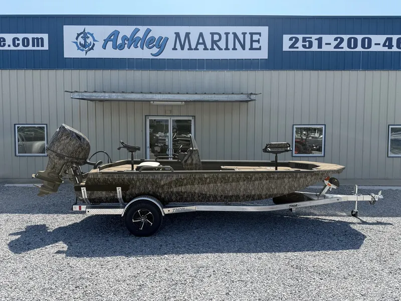 The Image of Thor LAKE HAMMER 1900 CC 2027 in front of a marine store. - 1