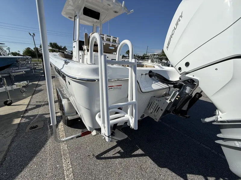 Slide: The Image of The image shows a boat with a powerful Mercury engine and a sturdy swim ladder. - 4