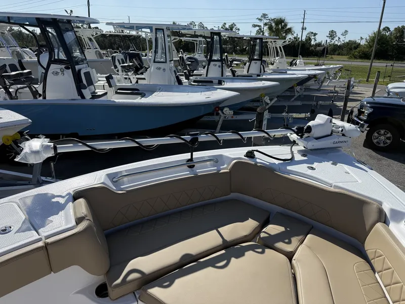 Slide: The Image of Blazer Makaira 2600-425HP MERCURY 2027 in a showroom with other boats. - 6