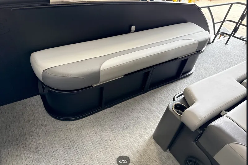 Slide: The Image of Interior seating of 2027 Godfrey Monaco 25' Tritoon, featuring a mid-table flip lounge. - 33