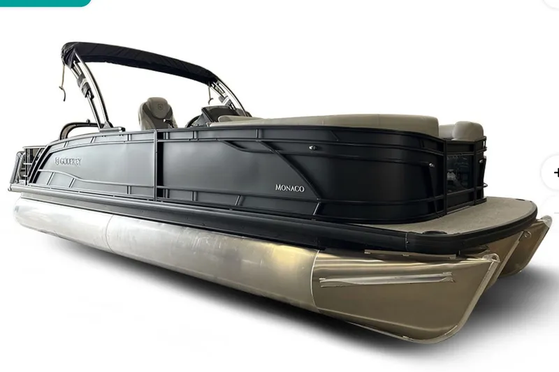 The Image of 2027 Godfrey Monaco 25' Mid-Table Flip Lounge Tritoon, sleek black design, side view. - 20