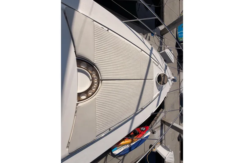 Slide: The Image of Overhead view of 2001 Fairline 55 yacht deck at marina. - 50