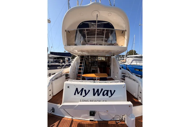 Slide: The Image of 2001 Fairline 55 yacht named "My Way" docked in Long Beach marina. - 11