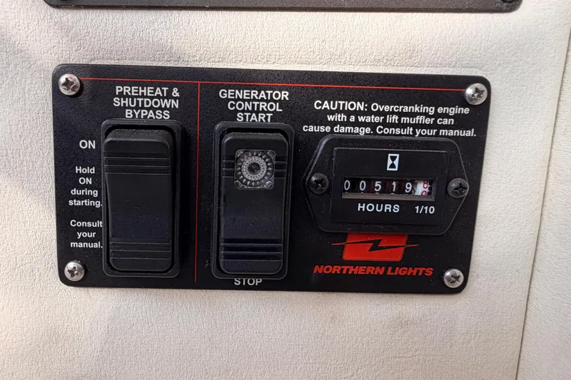 Slide: The Image of Control panel of a 2001 Fairline 55 yacht with generator hour meter. - 86