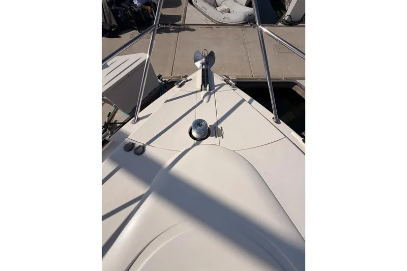 Slide: The Image of Bow view of 2001 Fairline 55 yacht docked at marina. - 51