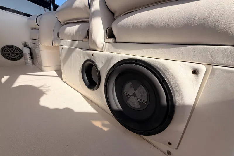 Slide: The Image of Interior of 2001 Fairline 55 yacht featuring audio system and seating. - 77