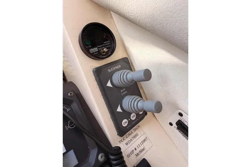 Slide: The Image of Control panel of a 2001 Fairline 55 yacht with joystick controls. - 87