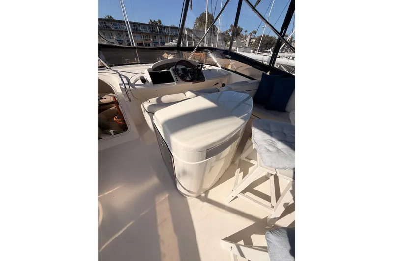 Slide: The Image of 2001 Fairline 55 yacht interior with helm, seating, and navigation equipment. - 66